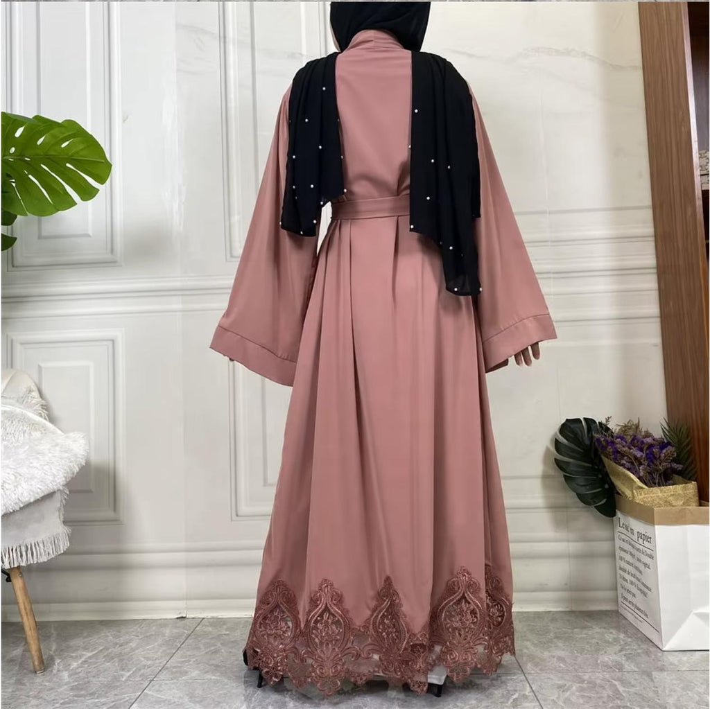 Elegant open Nida abaya with delicate lace hem and matching belt. Lightweight, flowing and modest, perfect for Eid, Ramadan, weddings, occasions or everyday wear. Wear open for layering or tie at the waist for a flattering fit.