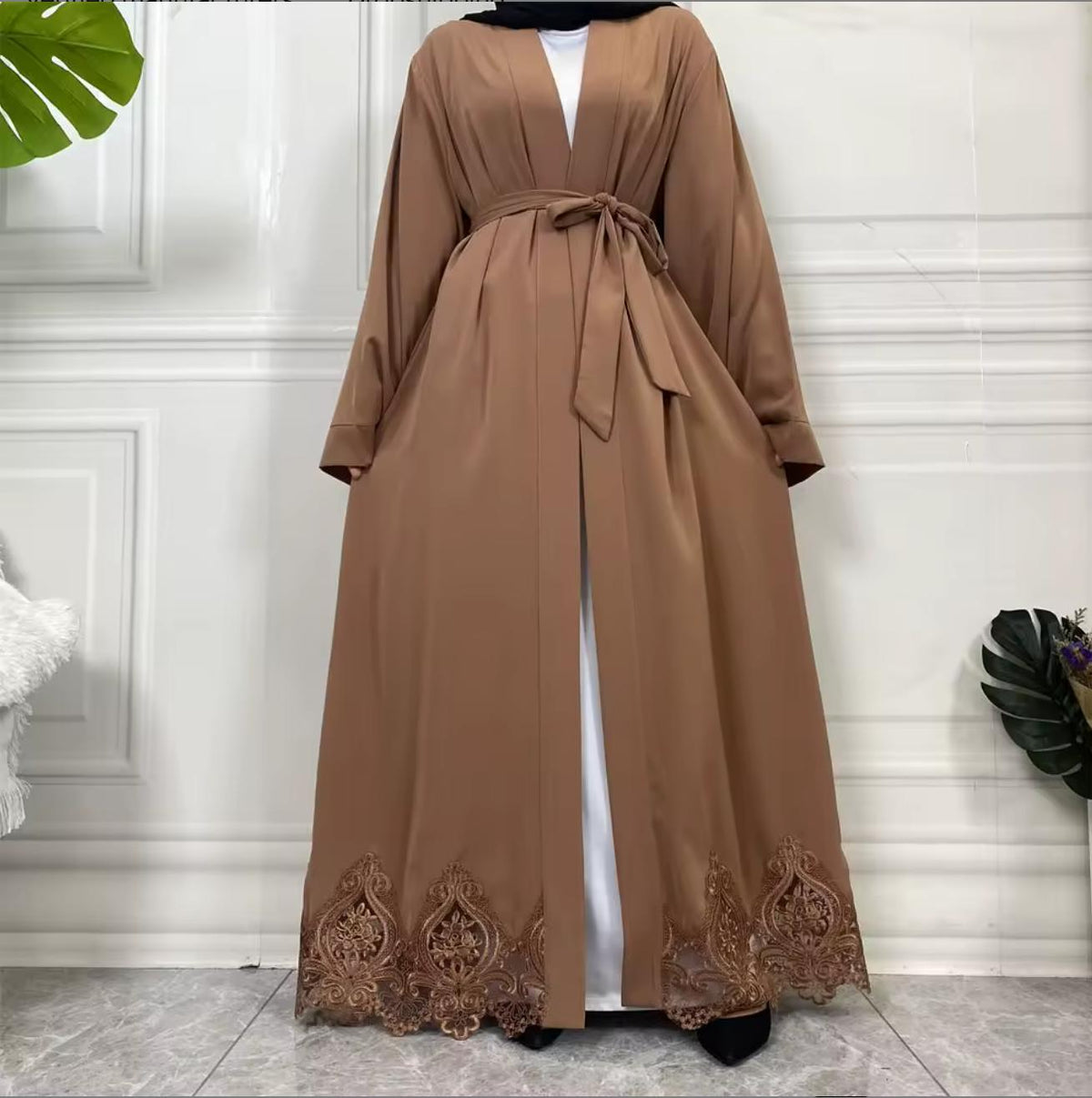 Elegant open Nida abaya with delicate lace hem and matching belt. Lightweight, flowing and modest, perfect for Eid, Ramadan, weddings, occasions or everyday wear. Wear open for layering or tie at the waist for a flattering fit.